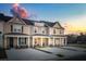 Charming townhomes boasting a welcoming front porch, offering a cozy curb appeal and a sense of community at 314 Green Fern Dr, Summerville, SC 29483