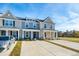 Well-maintained townhomes feature welcoming front porches and manicured lawns, enhancing curb appeal at 316 Green Fern Dr, Summerville, SC 29483