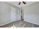 Bedroom boasts modern ceiling fan, closet, and light gray walls paired with modern flooring at 3564 Blanding Dr, Johns Island, SC 29455