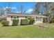 Charming single-story home with a well-manicured lawn and lovely landscaping at 3564 Blanding Dr, Johns Island, SC 29455