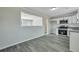 Modern kitchen with stainless steel appliances and view of the living room at 3564 Blanding Dr, Johns Island, SC 29455