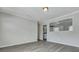 Bright open living room with view of the kitchen and new laminate flooring at 3564 Blanding Dr, Johns Island, SC 29455