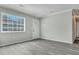 Bright open living room with a front door view and new laminate flooring at 3564 Blanding Dr, Johns Island, SC 29455