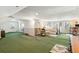 Spacious bedroom with bright green carpet and a comfy bed set at 4 St Teresa Dr, Charleston, SC 29407