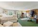 Open bedroom and office space featuring natural lighting and plush carpet at 4 St Teresa Dr, Charleston, SC 29407
