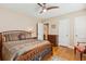 Spacious bedroom with hardwood floors, a ceiling fan, and traditional furnishings at 4 St Teresa Dr, Charleston, SC 29407