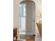 Arched hallway leading to a bathroom with tiled shower at 4 St Teresa Dr, Charleston, SC 29407