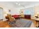 Comfortable living room featuring hardwood floors, soft lighting, and a mix of traditional furniture and decor at 4 St Teresa Dr, Charleston, SC 29407