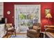 Charming sunroom with a view of the backyard, accessible from the living room at 4 St Teresa Dr, Charleston, SC 29407