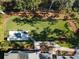 Beautiful aerial view of the backyard, pool, and patio of this well-manicured home at 4086 Lady Banks Ln, Ravenel, SC 29470