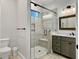 Contemporary bathroom showcasing a glass shower, gray vanity with a stylish sink, and a toilet at 4086 Lady Banks Ln, Ravenel, SC 29470