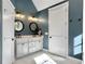 Modern bathroom featuring double sinks, black fixtures, and a stylish design at 4086 Lady Banks Ln, Ravenel, SC 29470