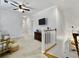 Open hallway area with carpet, a ceiling fan and doors at 4086 Lady Banks Ln, Ravenel, SC 29470