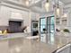 Spacious kitchen showcasing a large center island, quartz countertops, and stylish pendant lights at 4086 Lady Banks Ln, Ravenel, SC 29470
