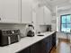 Well-equipped kitchenette featuring modern appliances, sleek countertops, and ample cabinet space at 4086 Lady Banks Ln, Ravenel, SC 29470