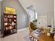 Bright office featuring carpet floors, sloped ceiling, and built-in shelving at 4086 Lady Banks Ln, Ravenel, SC 29470