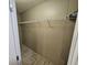 Walk-in closet with white shelving and wood-look flooring at 4532 S Carolina # 41, Huger, SC 29450