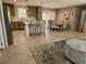 Spacious kitchen overlooking living room with an island, stainless appliances, and dining area at 4532 S Carolina # 41, Huger, SC 29450