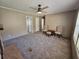 Open living room with plush carpeting and neutral color palette at 4532 S Carolina # 41, Huger, SC 29450