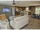 Open concept living room with wood floors, a modern ceiling fan, and a beautiful seating area at 4532 S Carolina # 41, Huger, SC 29450