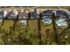 Aerial view showcases homes with pools and expansive backyards in a well-planned community at 460 Cool Bend Ln, Summerville, SC 29486