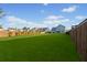 Spacious backyard featuring a lush green lawn and a view of neighboring houses at 460 Cool Bend Ln, Summerville, SC 29486