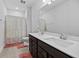 Modern bathroom with double sink vanity, large mirror, and shower-tub combination at 460 Cool Bend Ln, Summerville, SC 29486