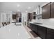 Spacious kitchen featuring a large island, stainless steel appliances, and dark wood cabinets at 460 Cool Bend Ln, Summerville, SC 29486