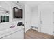 Mud room with built-in storage bench, hooks, and desktop workspace at 460 Cool Bend Ln, Summerville, SC 29486