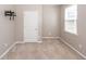 Neutral bedroom is filled with natural light and provides relaxation and comfort at 4809 Bushel Rd, Ladson, SC 29456
