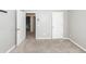 This bedroom has carpeted floors, white walls, and doors leading to hallway and closet at 4809 Bushel Rd, Ladson, SC 29456