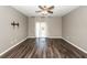 Bedroom boasts a ceiling fan and a glass door that leads to a backyard at 4809 Bushel Rd, Ladson, SC 29456