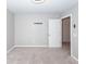 Neutral bedroom with carpeted floors, neutral walls, and an open closet with a view at 4809 Bushel Rd, Ladson, SC 29456