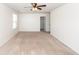 Light-filled bedroom with neutral carpet, ceiling fan, and white trim at 4809 Bushel Rd, Ladson, SC 29456