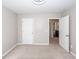 Bedroom features plush carpeting, neutral walls, and an open ensuite bathroom and walk-in closet at 4809 Bushel Rd, Ladson, SC 29456