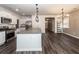 Bright kitchen with hardwood floors and views into the living room, perfect for entertaining at 4809 Bushel Rd, Ladson, SC 29456