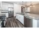 Modern kitchen features stainless appliances, white cabinets and a granite island at 4809 Bushel Rd, Ladson, SC 29456