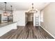 The open-concept dining area offers the perfect space for entertaining and gatherings at 4809 Bushel Rd, Ladson, SC 29456