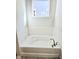 Classic white bathtub and white subway tile surround at 482 Oak View Way, Summerville, SC 29483