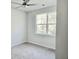 Bright bedroom featuring a ceiling fan, plush carpet, and a window offering natural light at 482 Oak View Way, Summerville, SC 29483