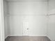 Spacious closet featuring wire shelving, a door, and neutral carpeting for ample storage at 482 Oak View Way, Summerville, SC 29483