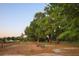 Dog park view with trees, a dog water fountain, and a seating area at 482 Oak View Way, Summerville, SC 29483