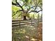 Custom wooden treehouse with multiple levels and access points surrounded by a wooden fence at 482 Oak View Way, Summerville, SC 29483