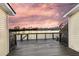 Beautiful lake views from this outdoor back deck with wood railing and lovely clouds overhead at 4913 Lake Palmetto Ln, North Charleston, SC 29418