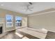 Inviting bedroom with water views, fireplace, and a sliding door leading to the outdoor balcony at 4913 Lake Palmetto Ln, North Charleston, SC 29418