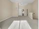 Large bonus room, neutral walls, carpet, and ceiling fan at 4913 Lake Palmetto Ln, North Charleston, SC 29418