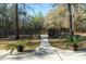 Well maintained backyard including a wooden fence and planted trees in pots at 5367 Boone Run, Hollywood, SC 29449