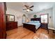 Cozy bedroom with wood floors, ceiling fan, and matching bedroom furniture at 5367 Boone Run, Hollywood, SC 29449