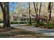 Beautifully landscaped home with a long driveway and blooming bushes, trees adding to the curb appeal at 5367 Boone Run, Hollywood, SC 29449