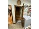 Laundry room with washer and dryer, open staircase to basement, and adjacent room at 5367 Boone Run, Hollywood, SC 29449